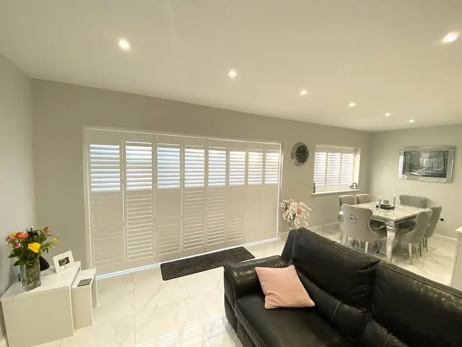 Full-width shutters across an open-plan Essex living space